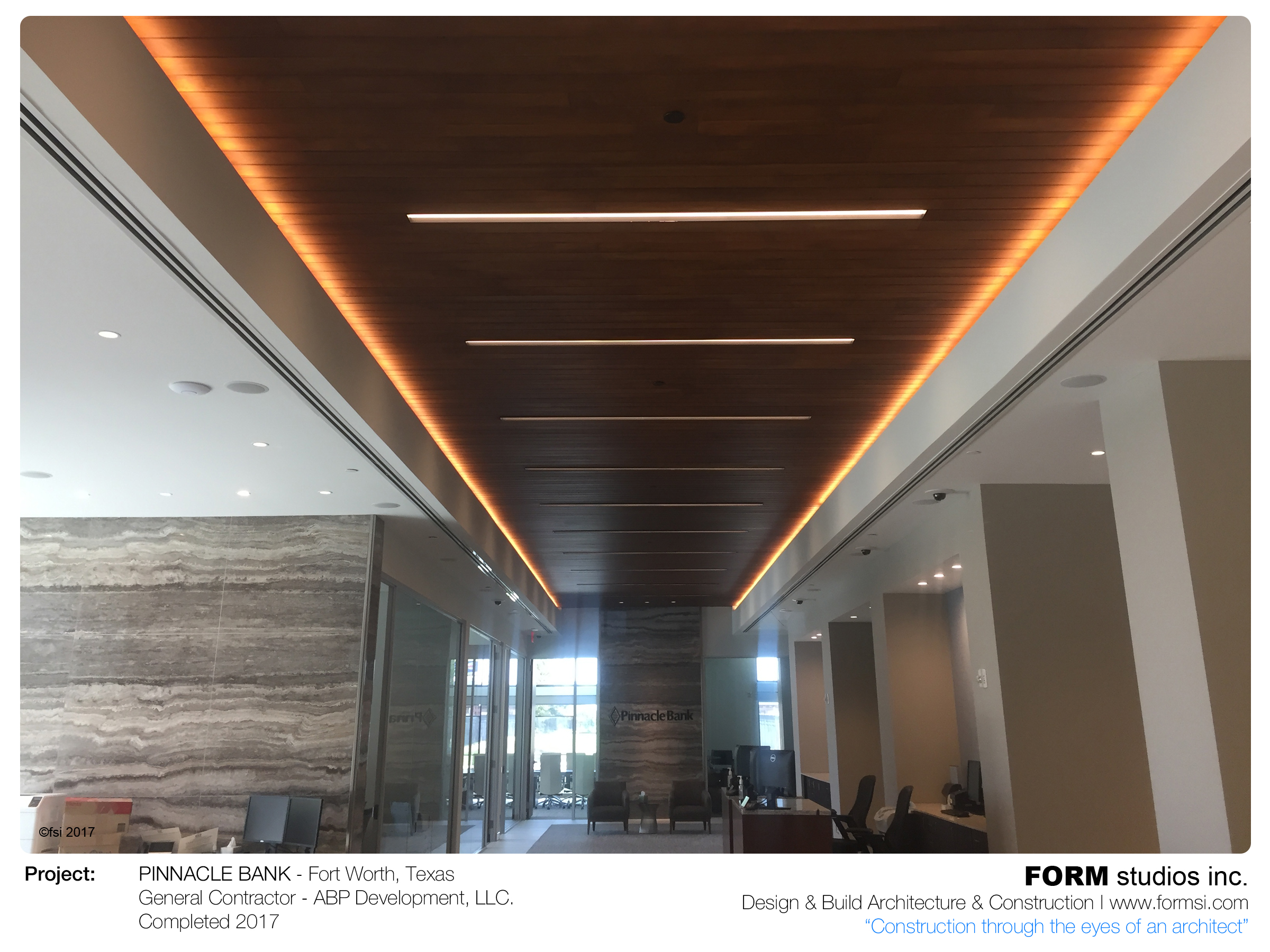 WALNUT SLAT WOOD LOBBY CEILING WITH LED COVE & SLOT LIGHTING